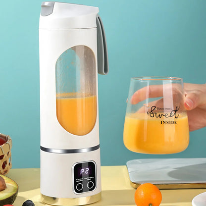 Portable USB Juicer Cup in use, blending fresh juice, with a glass of juice nearby.